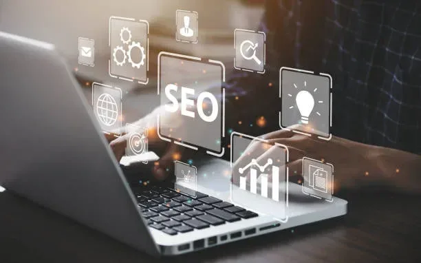 Close-up of a professional working on a laptop with digital SEO icons showing analytics, growth charts, and strategy ideas.